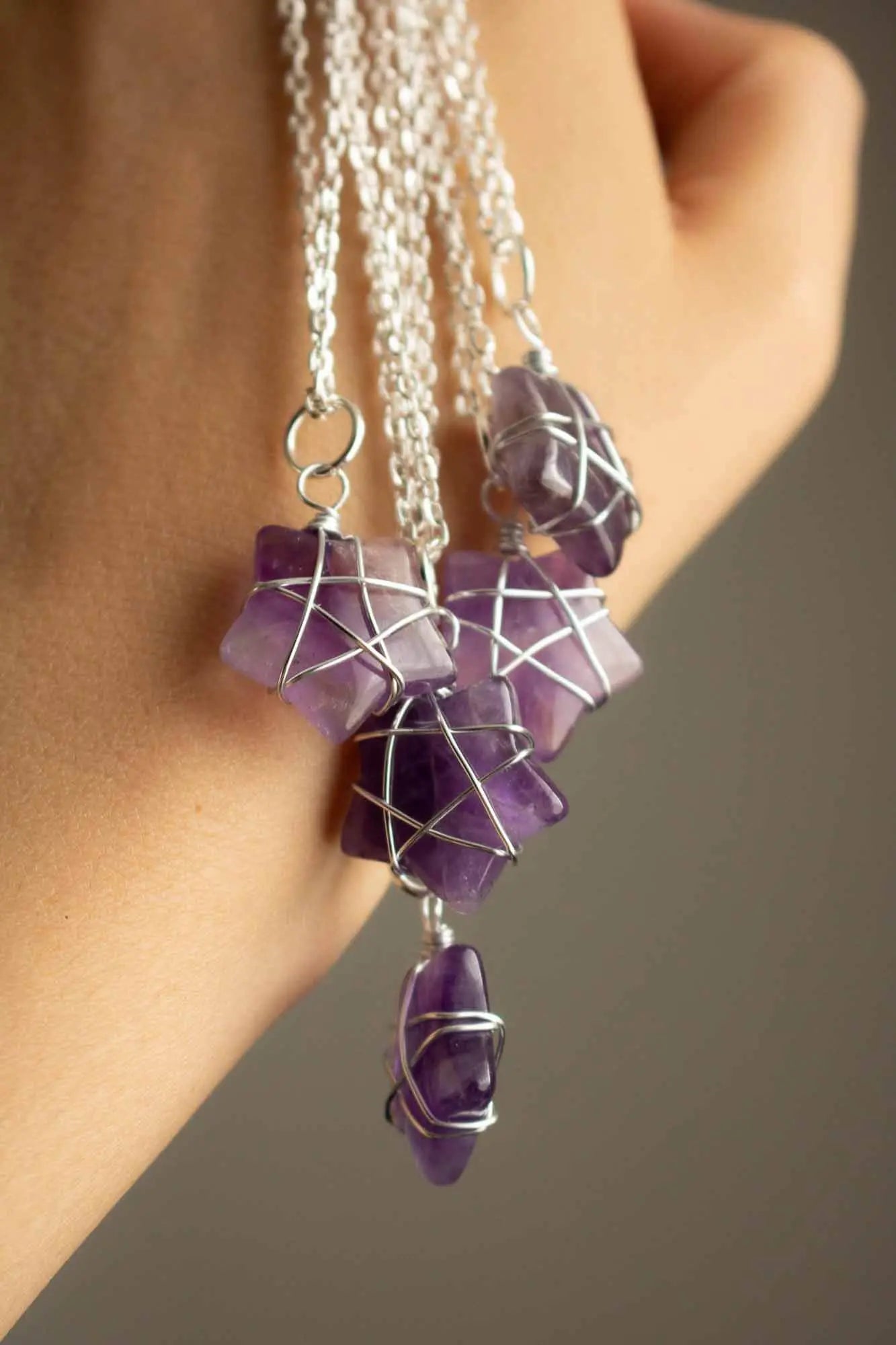 Pendentif étoile en Améthyste et fil argenté lunamanashop