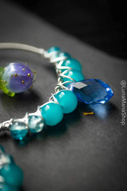 Boucles d'oreilles Bourgeon bleuté avec perles de verre lunamanashop